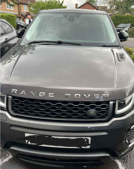 Shiny blue car after exterior wash